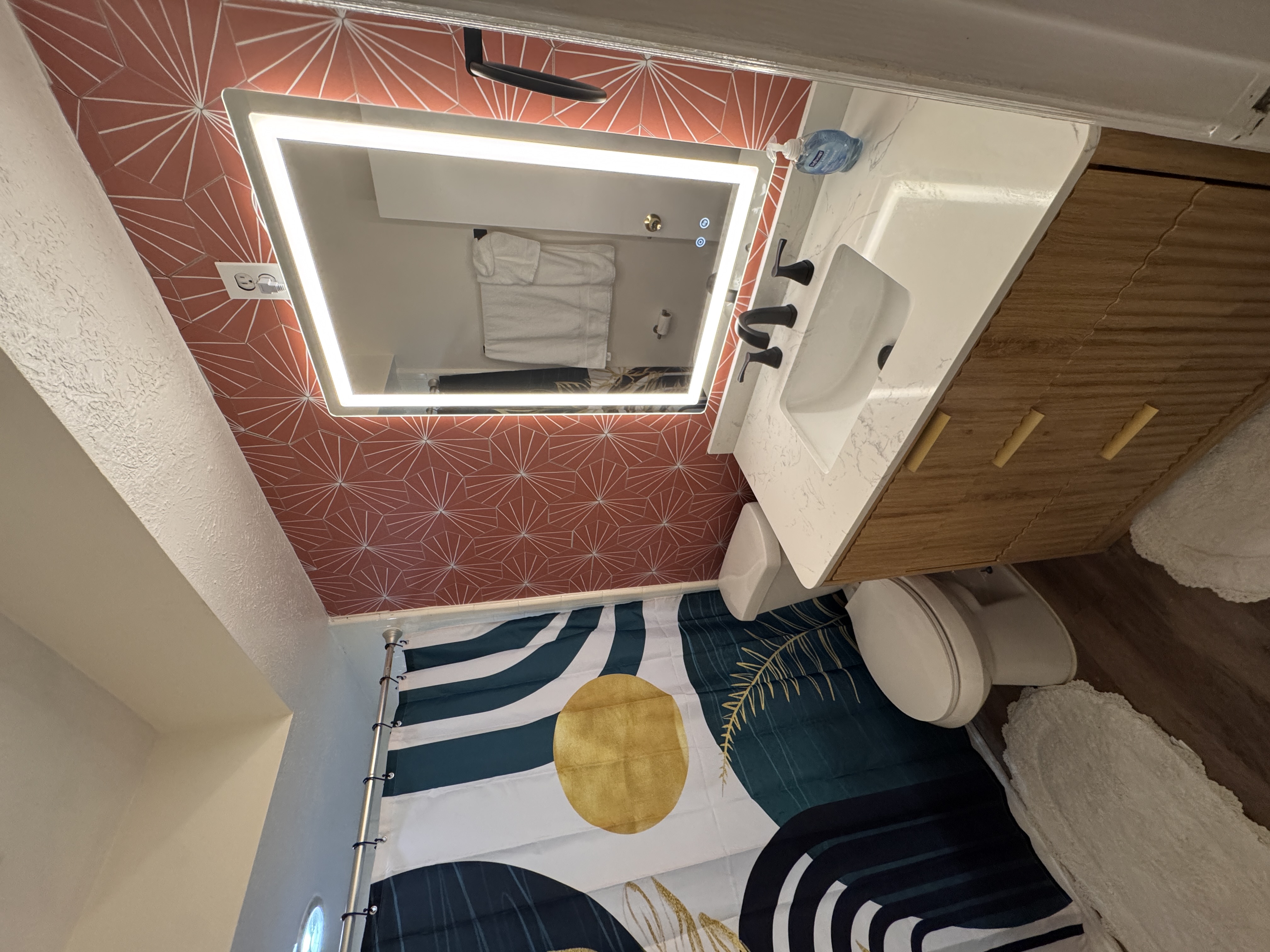 Updated bathroom with tiled shower